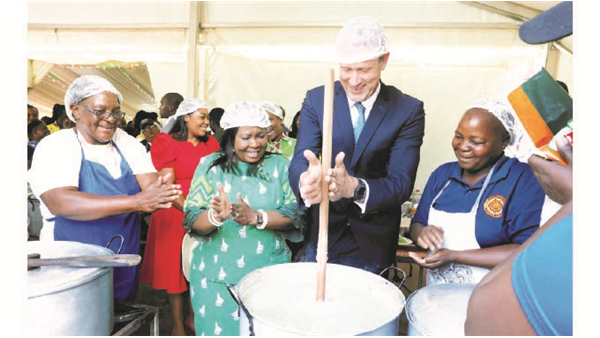 Diplomats Join First Lady In Preparing, Serving Traditional Dishes